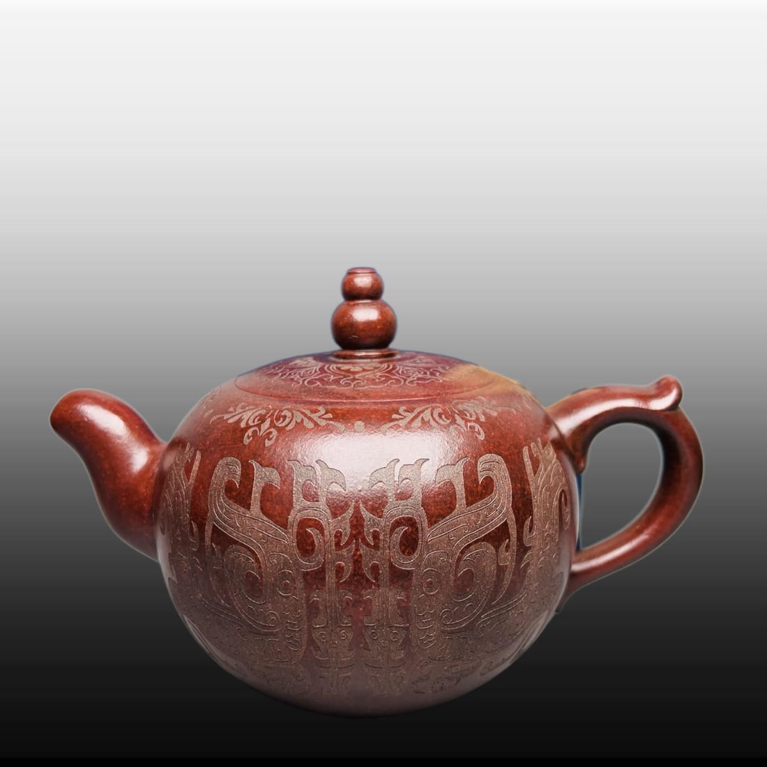 A Exquisite Purple Sands Beast-Face Pattern Round Teapot: A Exquisite Purple Sands Beast-Face Pattern Round Teapot,Republic of China,With Mark,Size:4.3inx5.1in 紫砂兽面纹圆壶,民国,带款