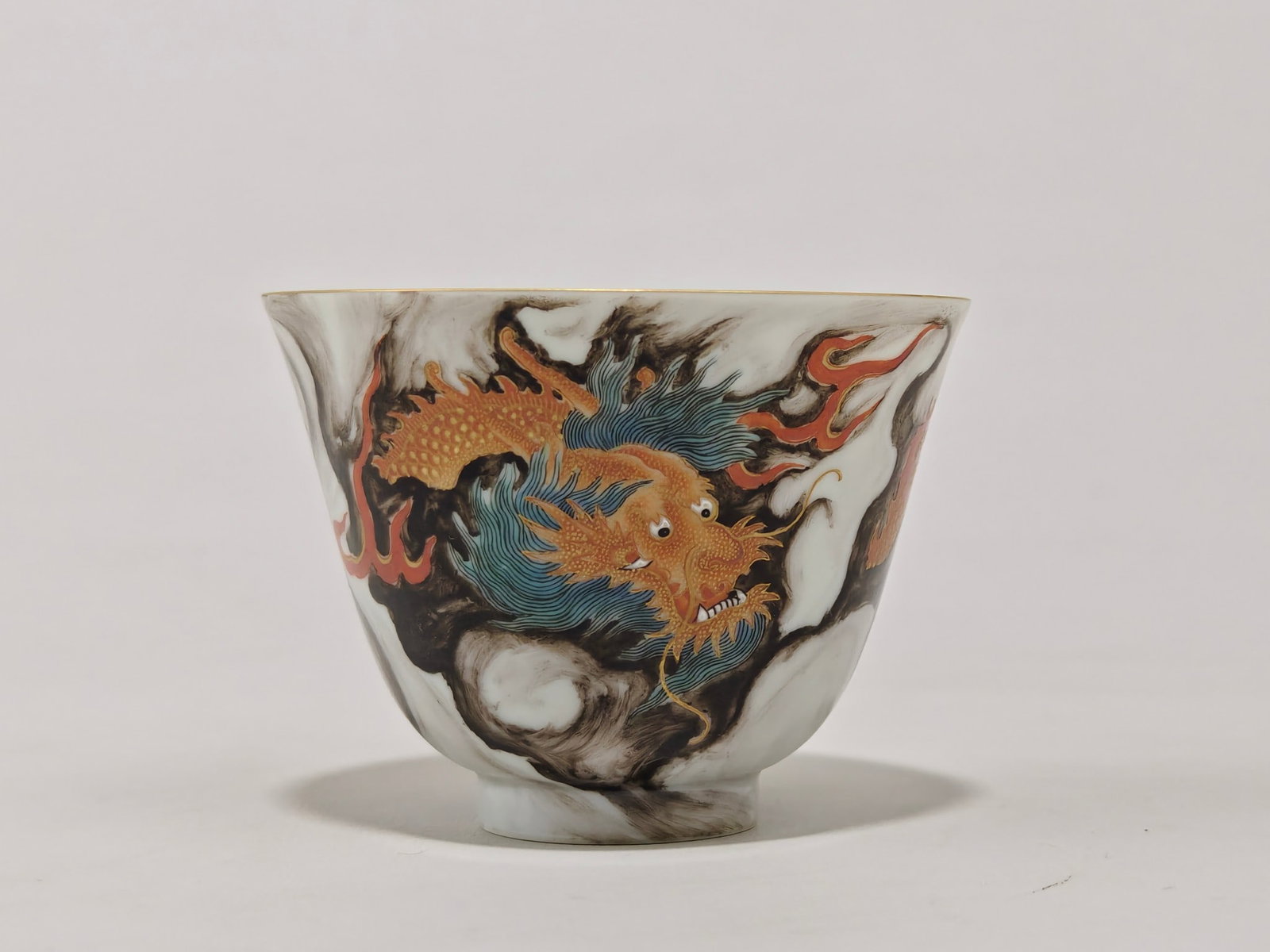A Exquisite Ink Color Painted Gold Dragon Pattern Cup: A Exquisite Ink Color Painted Gold Dragon Pattern Cup,Qing Dynasty, China,Yongzheng Six-character Mark,Size:2.4inx3.2in 墨彩描金龙纹杯,中国清