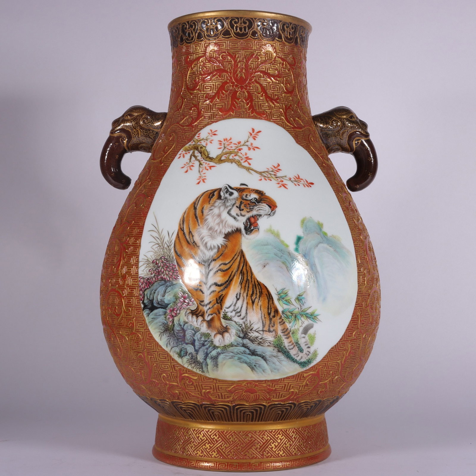 A Exquisite Famille-Rose Iron-Red Carved Painted Gold Tiger Pattern Double-Ears Vase: A Exquisite Famille-Rose Iron-Red Carved Painted Gold Tiger Pattern Double-Ears Vase,Qing Dynasty, China,Yongzheng Four-character Mark,Size:12.2inx7.3in 粉彩矾红雕刻