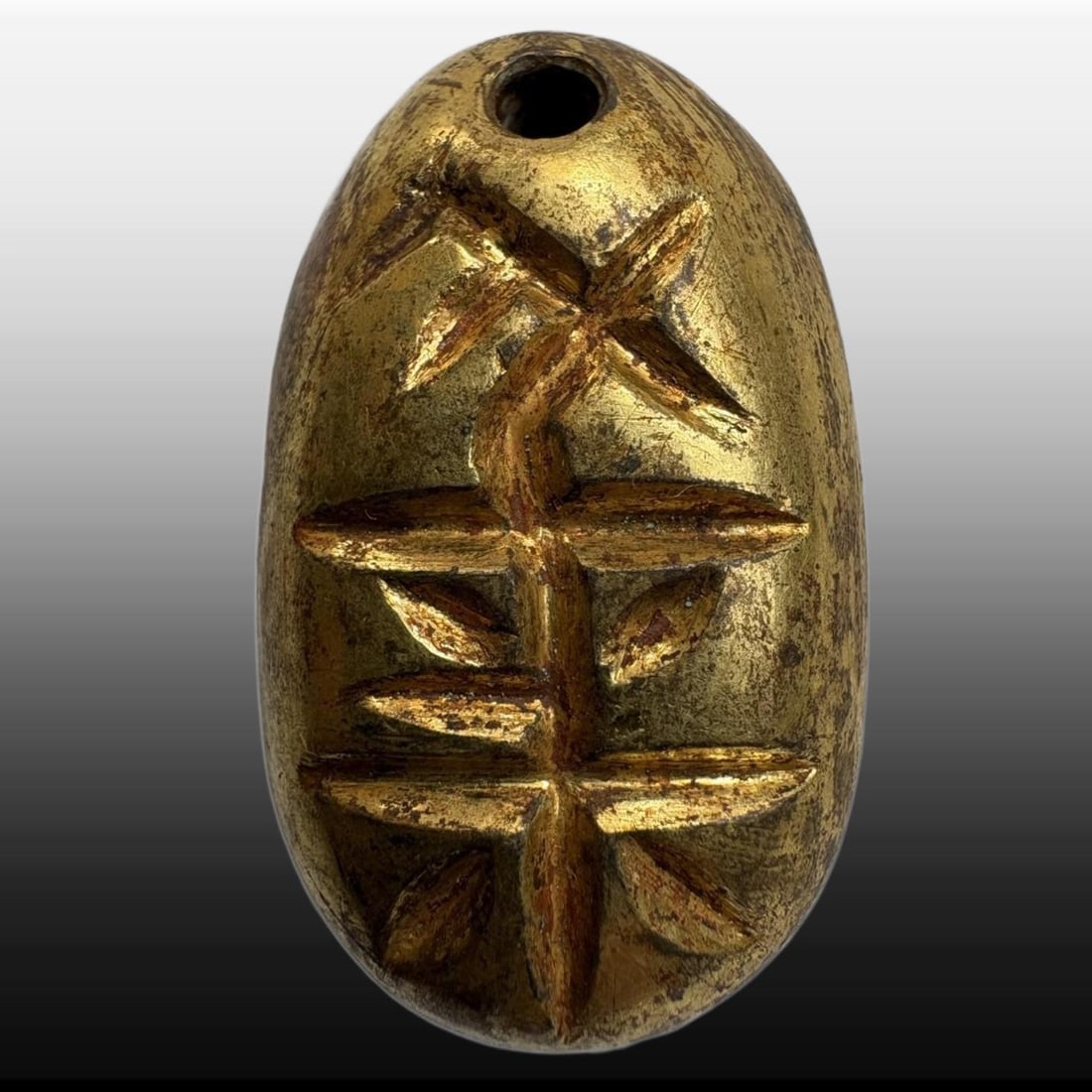 A Exquisite Gilt Bronze Coin: A Exquisite Gilt Bronze Coin,Han Dynasty, China,Size:0.7inx1.3in,Weight:26.3g 铜鎏金鬼脸金钱,中国汉代