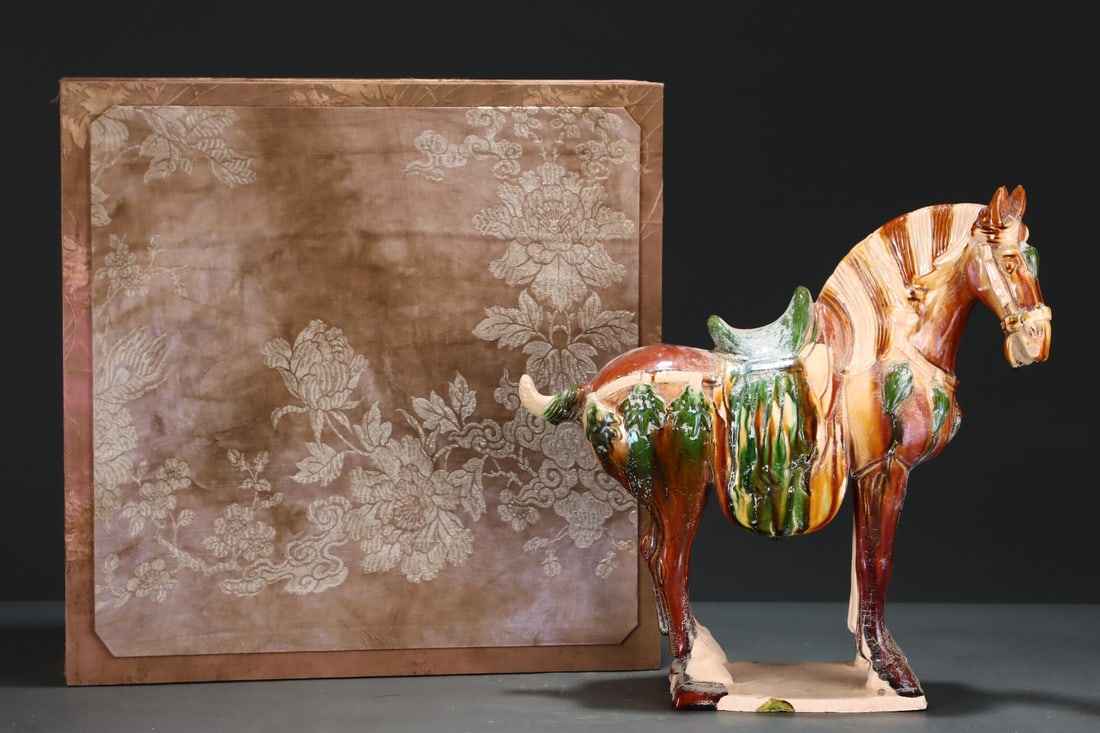 A Exquisite Tri-Color Glazed Horse Ornament: A Exquisite Tri-Color Glazed Horse Ornament,Tang Dynasty, China,Size:15.2inx15.6in 三彩马摆件,中国唐代