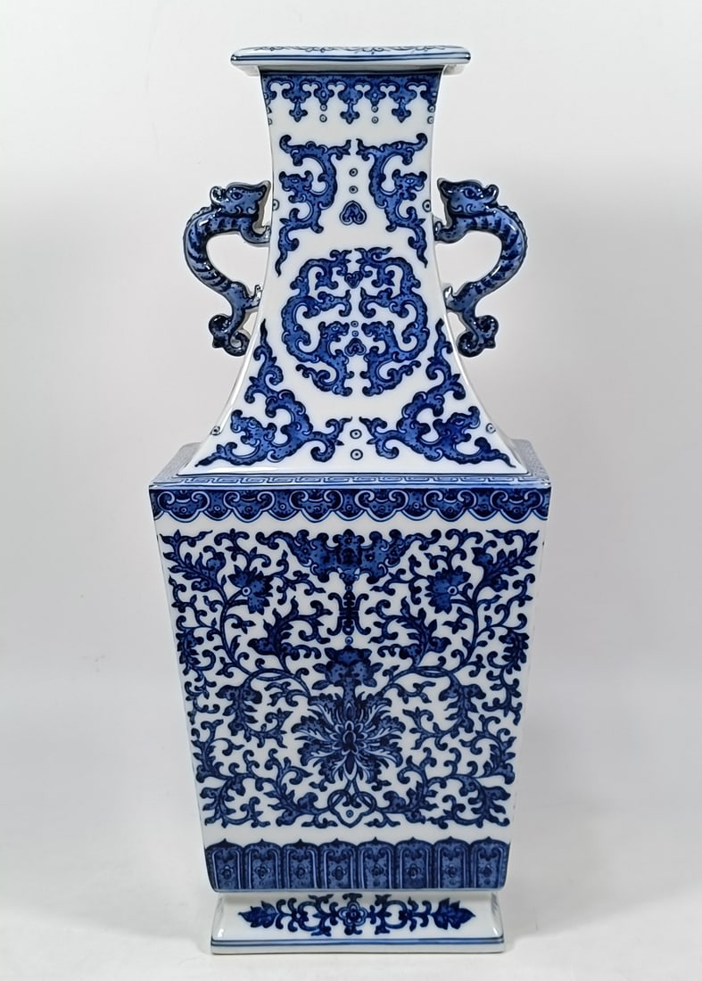 A Exquisite Blue and White Lotus Pattern Double-Ears Vase: A Exquisite Blue and White Lotus Pattern Double-Ears Vase,Qing Dynasty, China,Qianlong Six-character Mark,Size:15.9inx6.9inx5.1in 青花缠枝莲纹双耳ல