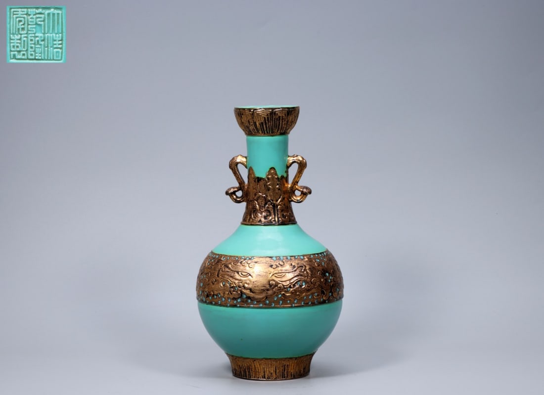 A Exquisite Turquoise-Glazed Bronze Color Dragon Pattern Ruyi-Ears Vase: A Exquisite Turquoise-Glazed Bronze Color Dragon Pattern Ruyi-Ears Vase,Qing Dynasty, China,Qianlong Six-character Mark,Size:11.2inx2.8inx6.2inx3.3in,Weight:1372g