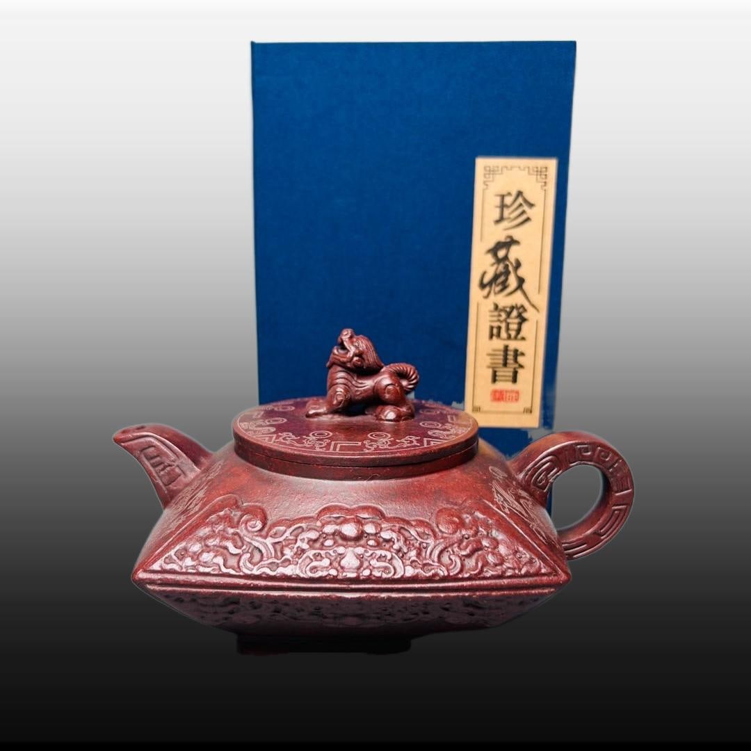 A Exquisite Purple Sands Lion Knob Beast-Face Pattern Flat Teapot: A Exquisite Purple Sands Lion Knob Beast-Face Pattern Flat Teapot,Republic of China,With Mark,Size:3.5inx4.7in 狮钮紫砂兽面纹扁壶,民国