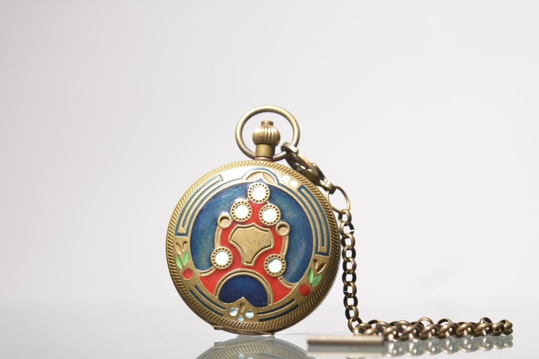 A Exquisite Brass Inlaid Enamel Flower Pattern Pocket Watch: A Exquisite Brass Inlaid Enamel Flower Pattern Pocket Watch,Qing Dynasty, China,Size:2.2in 黄铜嵌珐琅花卉纹怀表,中国清