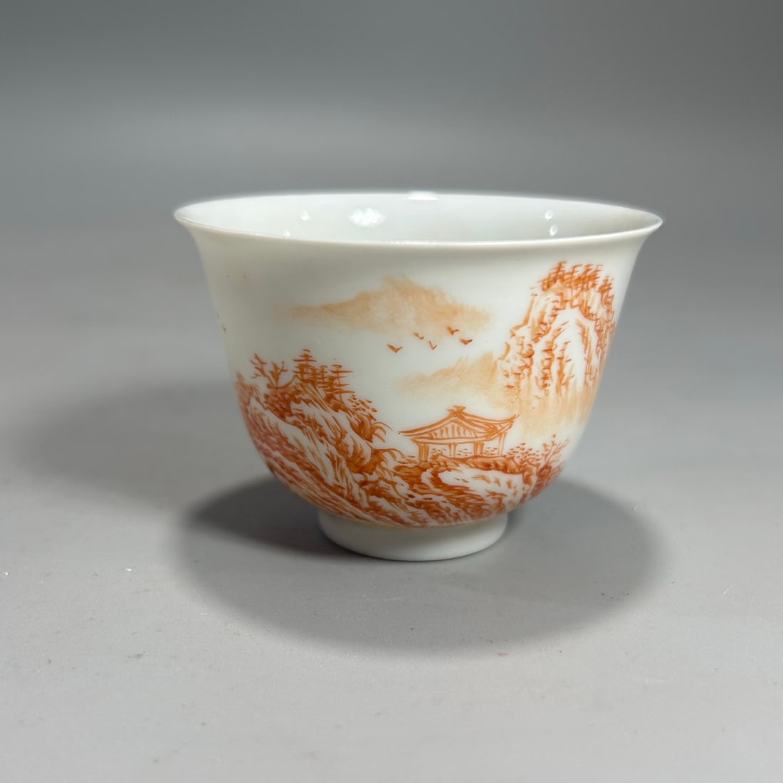 A Exquisite Iron-Red Landscape Pattern Cup: A Exquisite Iron-Red Landscape Pattern Cup,Qing Dynasty, China,Kangxi Six-character Mark,Size:1.9inx2.6in