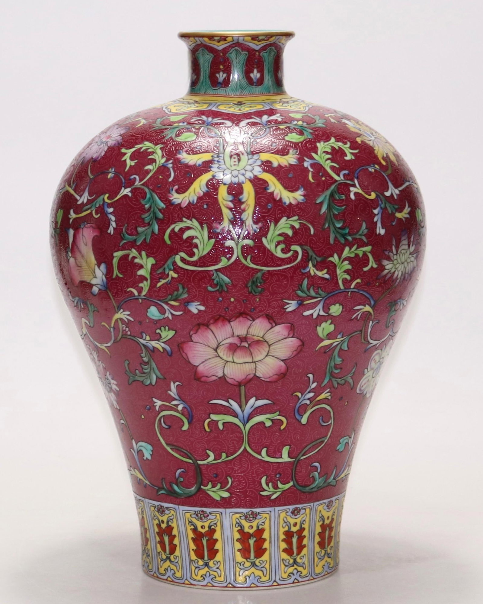 A Exquisite Ruby Red-Glazed Lotus Pattern Vase: A Exquisite Ruby Red-Glazed Lotus Pattern Vase,Qing Dynasty, China,Qianlong Six-character Mark,Size:15inx3.1in 胭脂红缠枝莲纹瓶,中国清