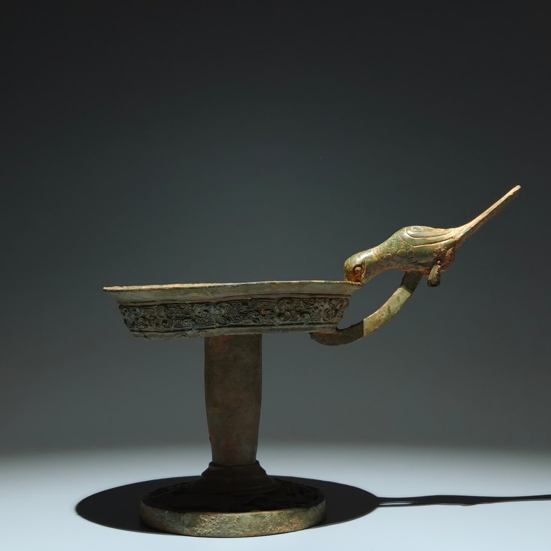 A Exquisite Bronze Bird-handle Candlestick: A Exquisite Bronze Bird-handle Candlestick,Han Dynasty, China,Size:9.4inx12.2inx7.5in 青铜鸟柄灯台,中国汉代