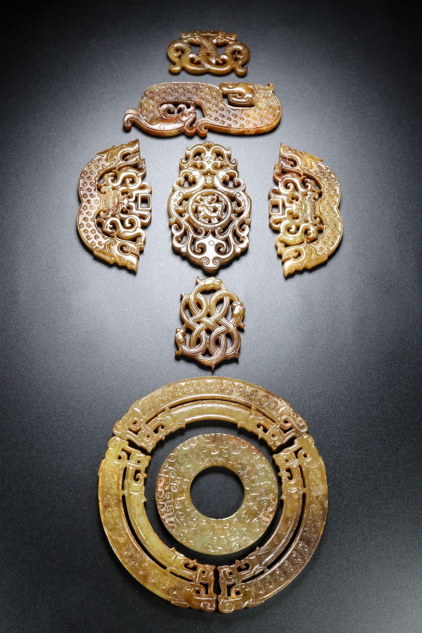 A Set of Exquisite Hotan Jade Bi: A Set of Exquisite Hotan Jade Bi,Han Dynasty, China,Size:18.9inx7.9inx0.2in ,Weight:379g 一套和田玉璧,中国汉代