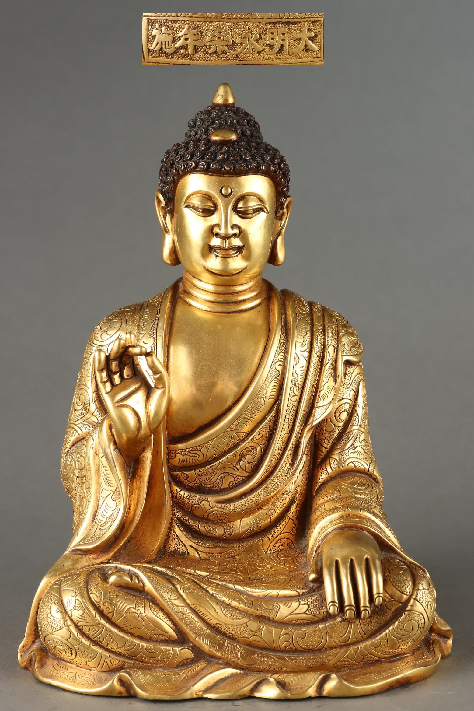 A Exquisite Gilt Bronze Buddha statue Ornament: A Exquisite Gilt Bronze Buddha statue Ornament,Ming Dynasty, China,Yongle Six-character Mark,Size:11.4inx8.3in ,Weight:7050g 紫铜鎏金佛像摆件,中&#