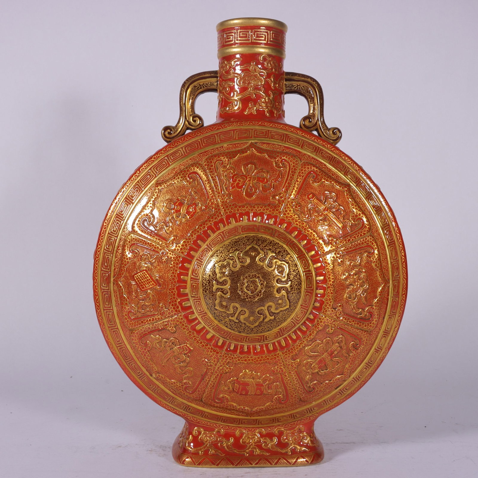 A Exquisite Iron-Red Carved Painted Gold Eight Treasures Pattern Double-Ears Vase: A Exquisite Iron-Red Carved Painted Gold Eight Treasures Pattern Double-Ears Vase,Qing Dynasty, China,Qianlong Six-character Mark,Size:13.8inx2.2inx9.4inx4.8in 矾红雕刻描