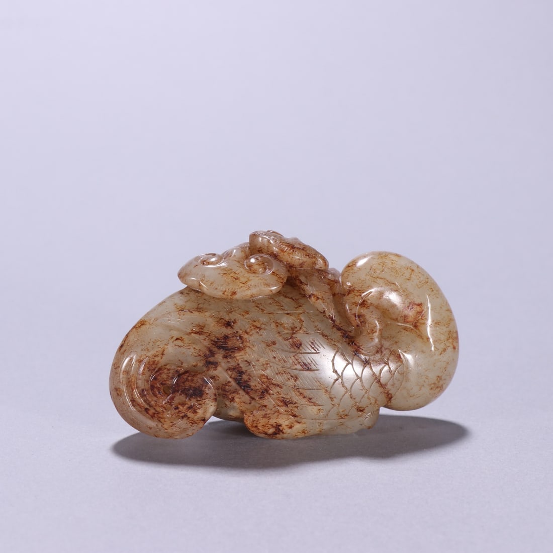 A Exquisite Hotan Bird Ornament: A Exquisite Hotan Bird Ornament,Han Dynasty, China,Size:3.1inx1.7in,Weight:125.3g 和田玉鸟摆件,中国汉代