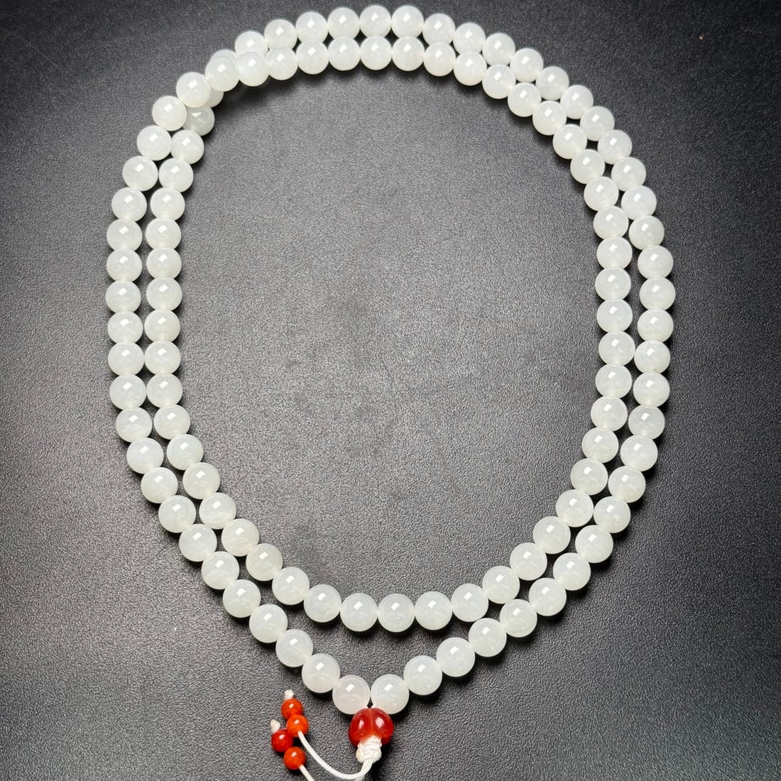 A Exquisite Hotan Jade Round beads Necklace: A Exquisite Hotan Jade Round beads Necklace,Qing Dynasty, China,Size:0.3in ,Weight:85g 和田玉佛珠项链,中国清代