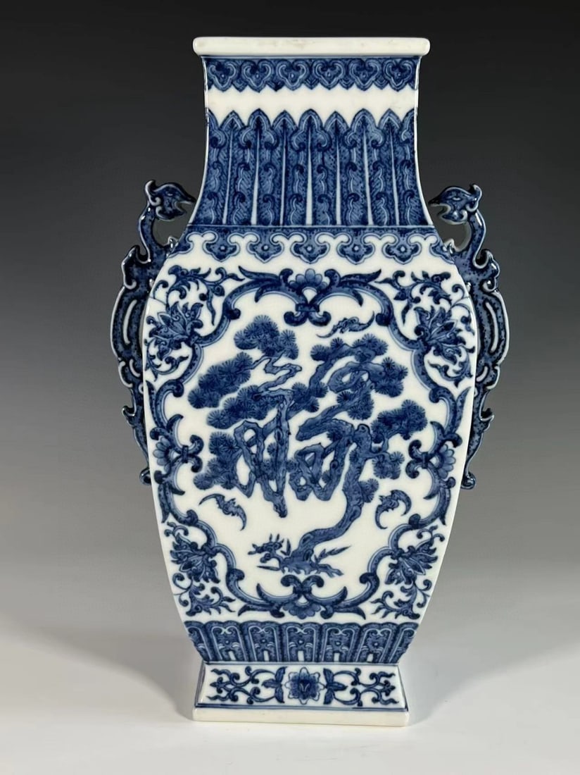 A Exquisite Blue and White Bats and Peach Pattern Dragon-Ears Vase: A Exquisite Blue and White Bats and Peach Pattern Dragon-Ears Vase,Qing Dynasty, China,Qianlong Six-character Mark,Size:15.6inx4.9inx5.1in 青花蝙蝠纹龙耳ī