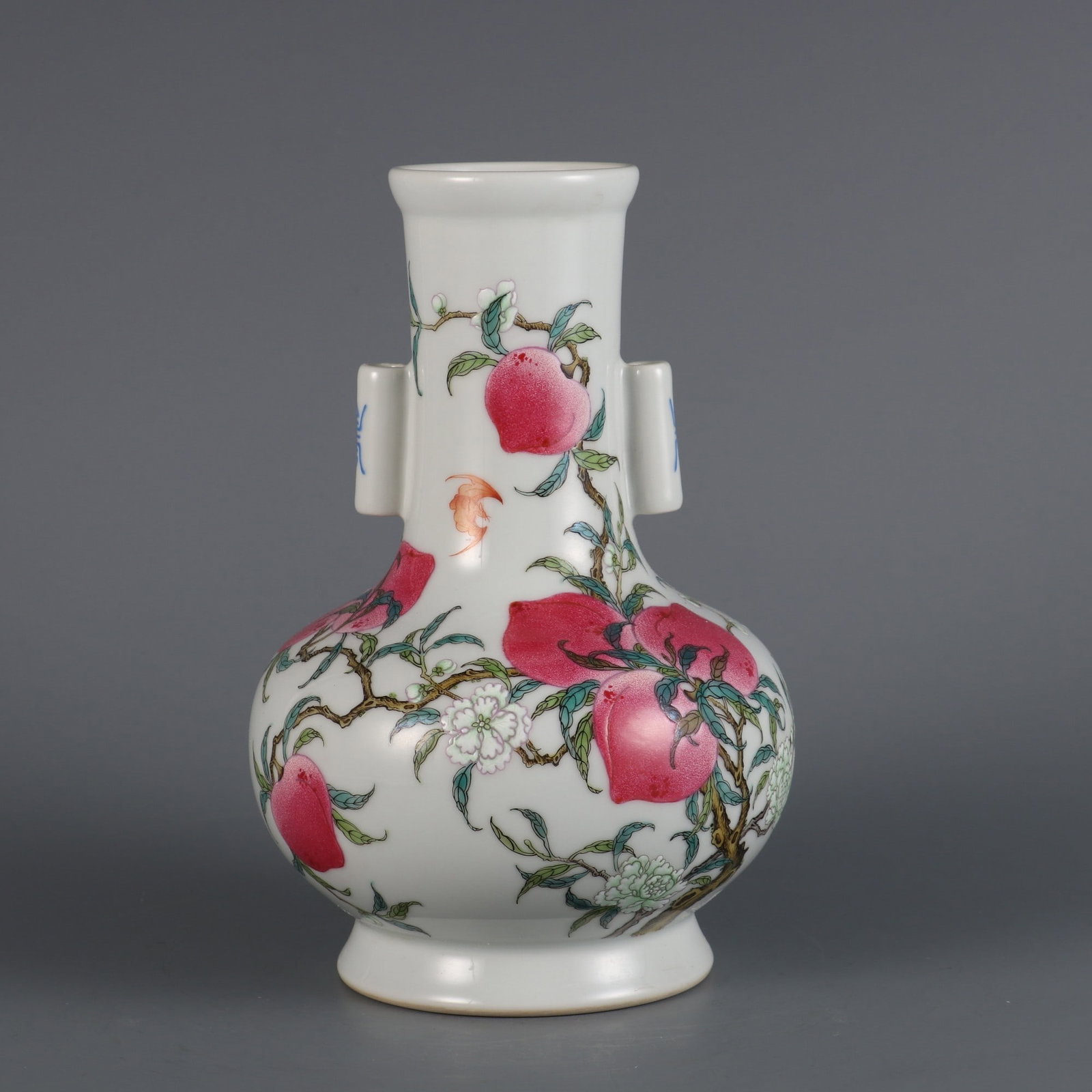 A Exquisite Famille-Rose Bats and Peach Pattern Pierce Ear Vase: A Exquisite Famille-Rose Bats and Peach Pattern Pierce Ear Vase,Qing Dynasty, China,Qianlong Four-character Mark,Size:8inx5.1inx2.4in 粉彩蝙蝠桃子纹贯&#