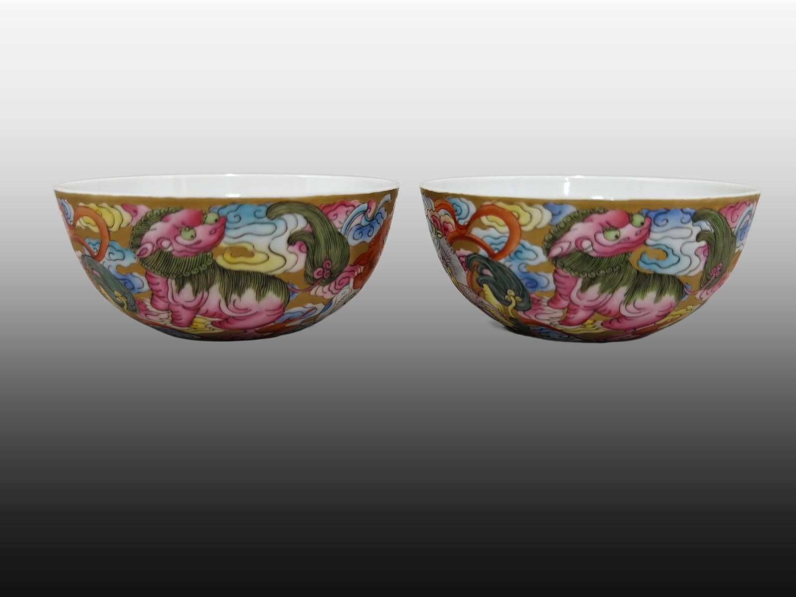 A pair of Exquisite Guan yao Gold Ground Lion Pattern Cup: A pair of Exquisite Guan yao Gold Ground Lion Pattern Cup,Qing Dynasty, China,Guangxu Six-character Mark,Size:1.5inx3.3in