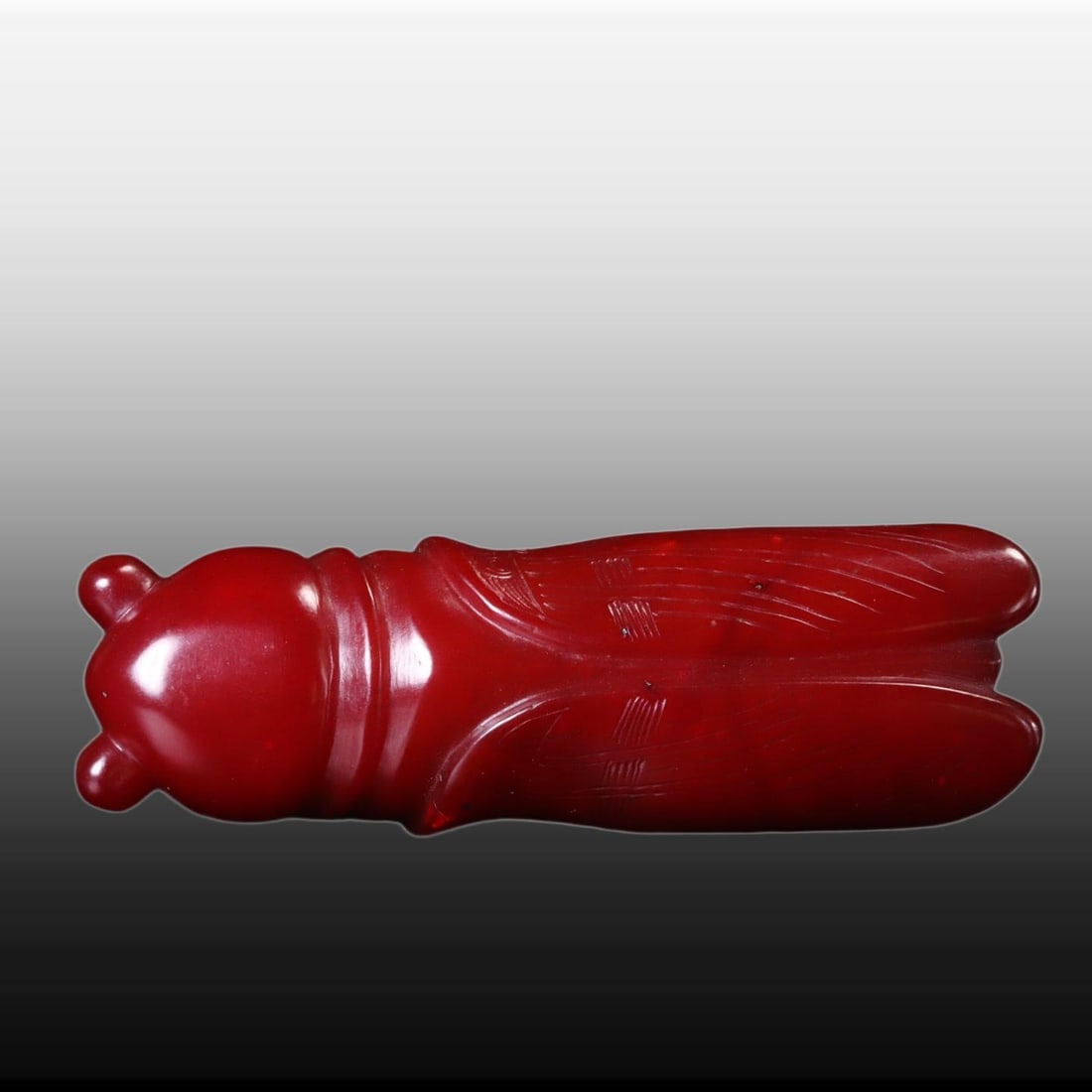 A Exquisite Gaogu Jade Cicada Handheld Carving: A Exquisite Gaogu Jade Cicada Handheld Carving,Ancient Time, China,Size:3inx0.9inx0.7in,Weight:53g 高古玉蝉手把件,远古时期