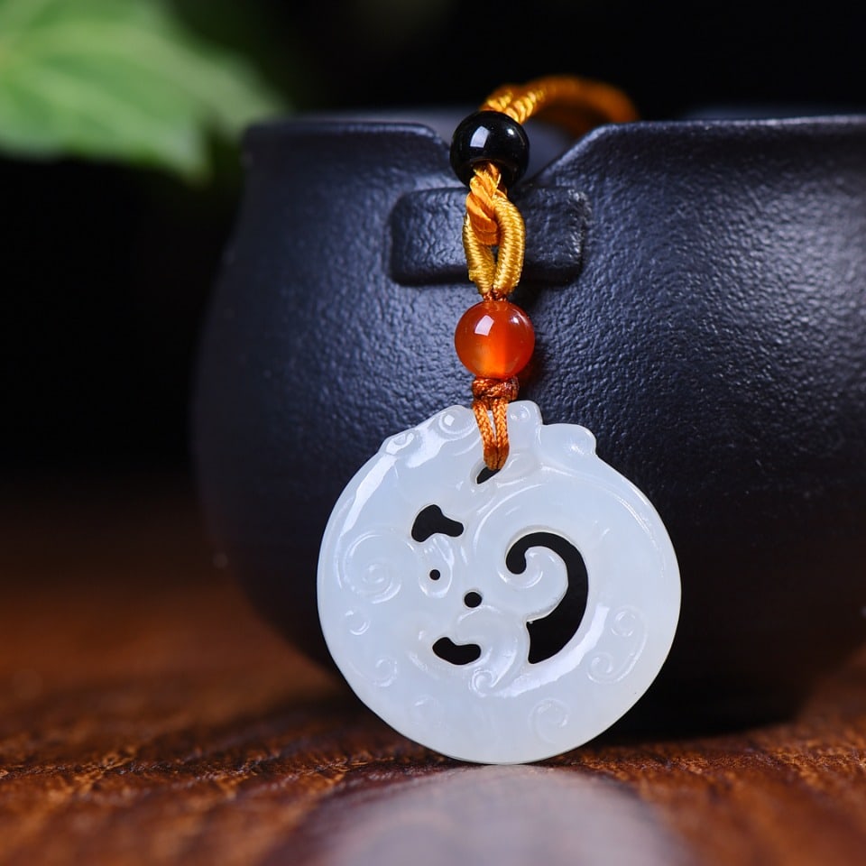 A Exquisite Hotan Jade Hollow Dragon Pendant: A Exquisite Hotan Jade Hollow Dragon Pendant,Size:1.1inx1.1inx0.3in 和田玉镂空龙吊坠