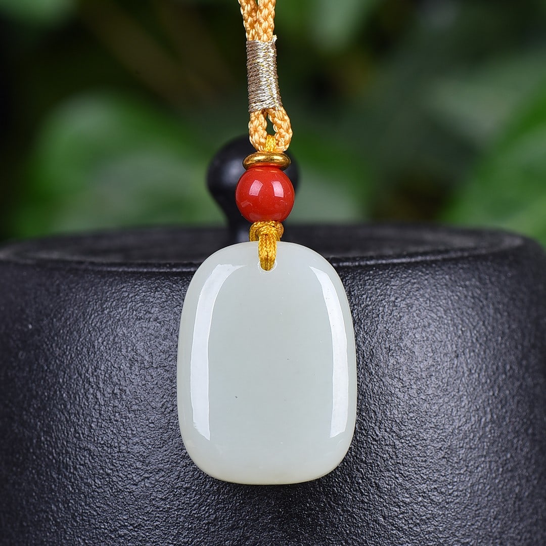 A Exquisite Hotan Jade Pendant: A Exquisite Hotan Jade Pendant,Size:0.7inx1in 和田玉平安无事牌