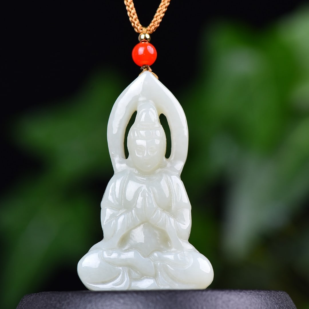 A Exquisite Hotan Jade Statue of Avalokitesvara Pendant: A Exquisite Hotan Jade Statue of Avalokitesvara Pendant,Size:1.2inx2.1in 和田玉观音吊坠