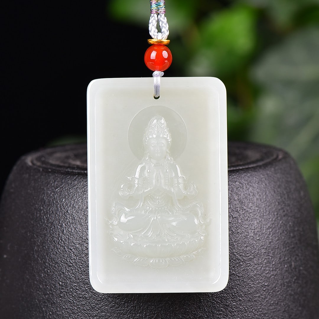A Exquisite Hotan Jade Statue of Avalokitesvara Pendant: A Exquisite Hotan Jade Statue of Avalokitesvara Pendant,Size:1.2inx1.8in 和田玉观音牌