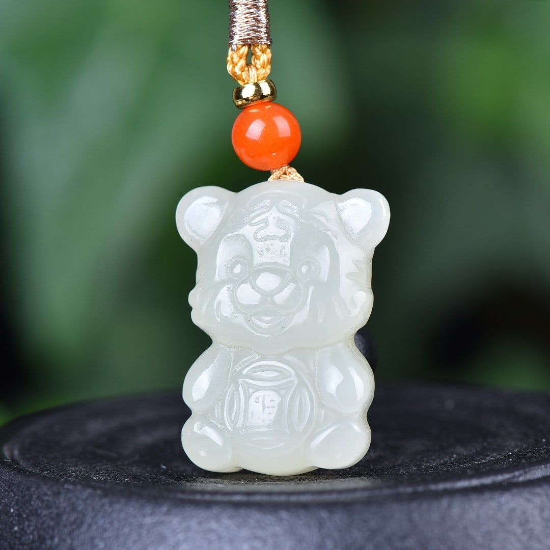 A Exquisite Hotan Jade Tiger Pendant: A Exquisite Hotan Jade Tiger Pendant,Size:0.7inx1in 和田玉招财虎吊坠