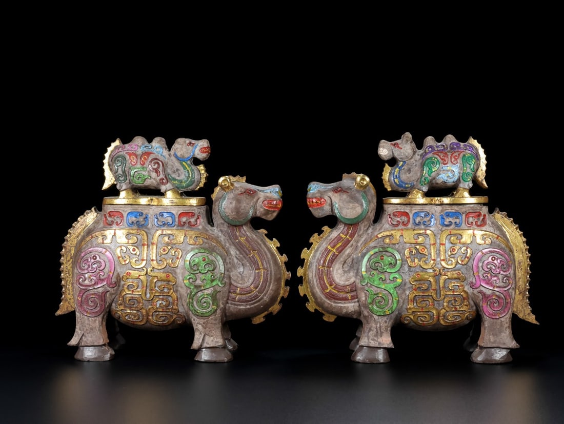An Exquisite White Jade Painted Color Camel-Shaped Censer: An Exquisite White Jade Painted Color Camel-Shaped Censer Han Dynasty, China Size:7.5inx8.3inx2.9in Weight:4.75kg白玉彩绘骆驼尊 中国汉ߣ