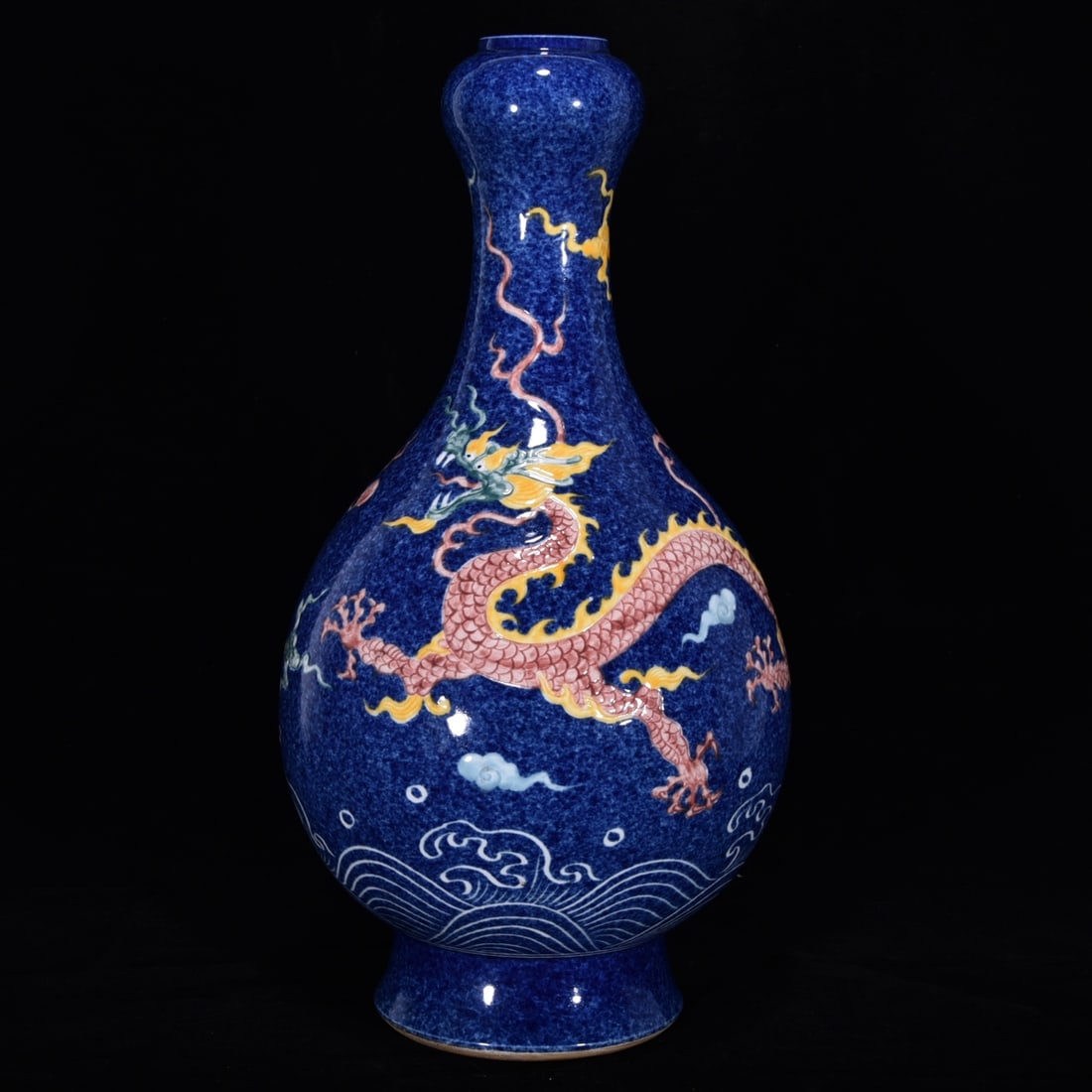 An Exquisite Blue and White Wucai Dragon Pattern Seawater Pattern Vase: An Exquisite Blue and White Wucai Dragon Pattern Seawater Pattern Vase Ming Dynasty, China Xuande Six-character Mark Size:16.9inx8.7in青花洒蓝釉五彩龙&#