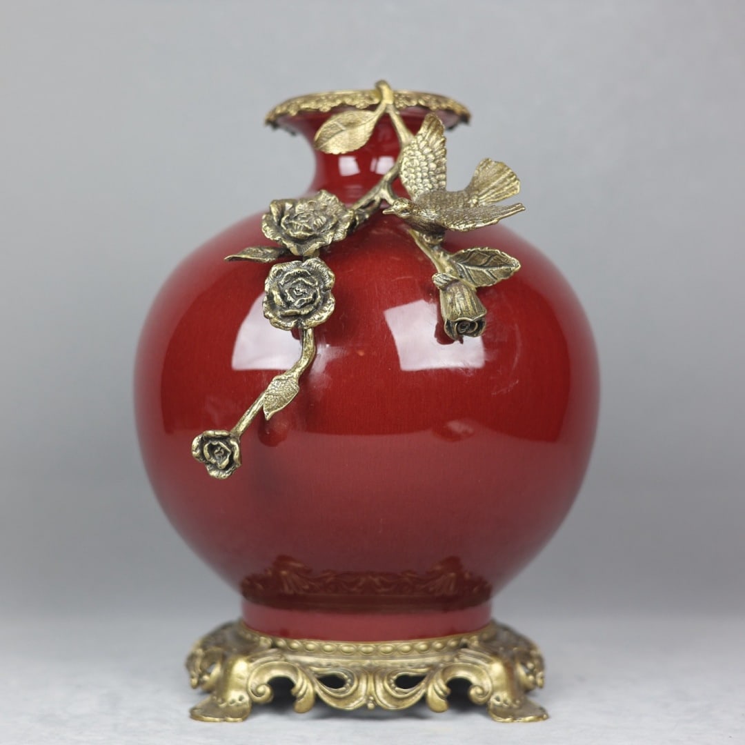 An Exquisite Iron-Red Inlaid Bronze Flower and Bird Pattern Vase: An Exquisite Iron-Red Inlaid Bronze Flower and Bird Pattern Vase Qing Dynasty, China Qianlong Six-character Mark Size:13inx9.8in矾红釉镶铜花鸟苹果