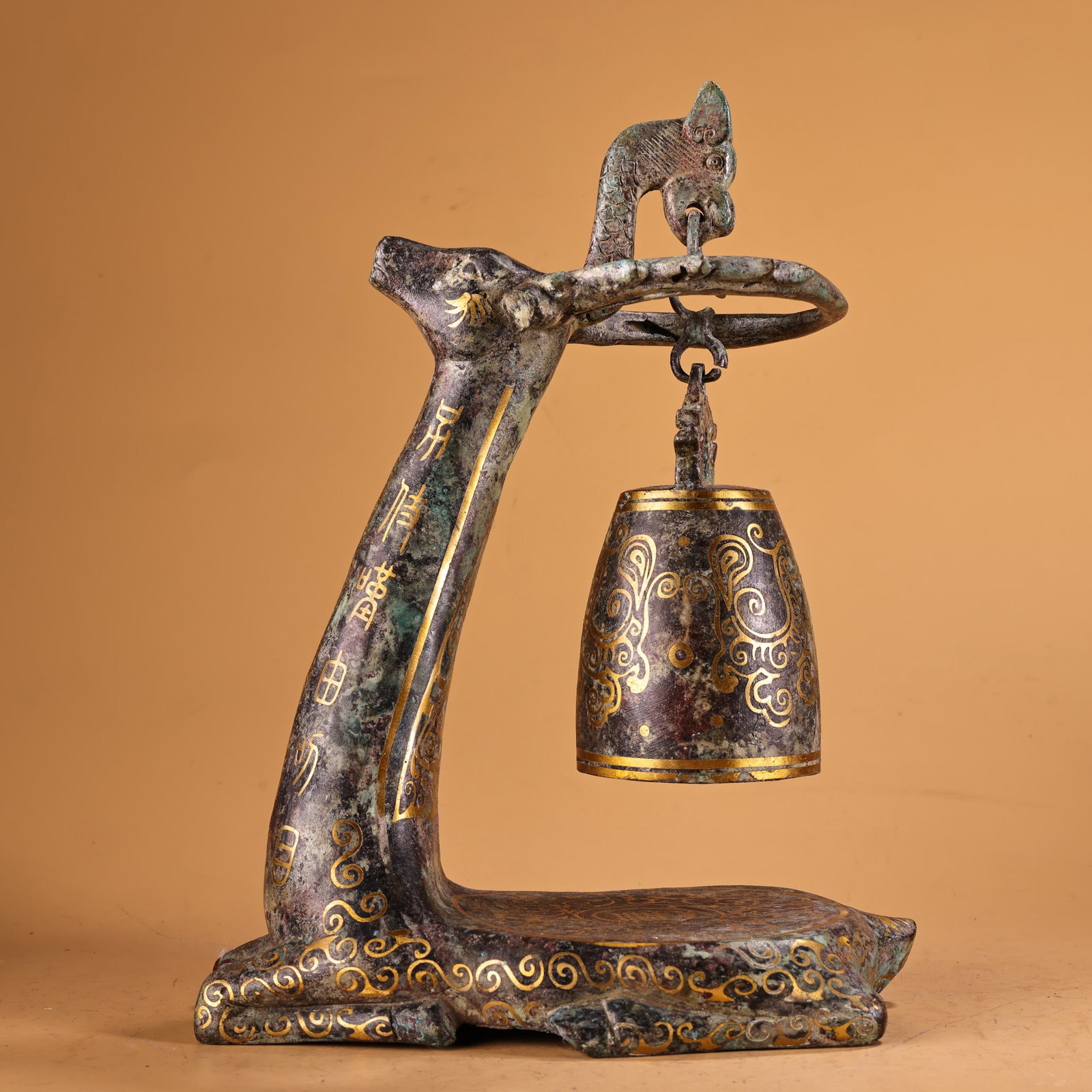 An Exquisite Bronze With Inscription Deer Ornament: An Exquisite Bronze With Inscription Deer Ornament Han Dynasty, China Size:10.6inx7.5in Weight:1500g青铜搓金带铭文鹿挂钟 中国