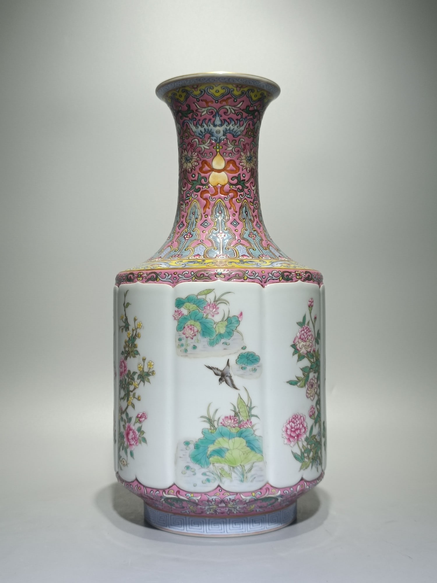 An Exquisite Famille-Rose Lotus Pattern Flower and Bird Pattern Vase: An Exquisite Famille-Rose Lotus Pattern Flower and Bird Pattern Vase Qing Dynasty, China Qianlong Six-character Mark Size:13.4inx6.5in粉彩宫粉地福寿连&#