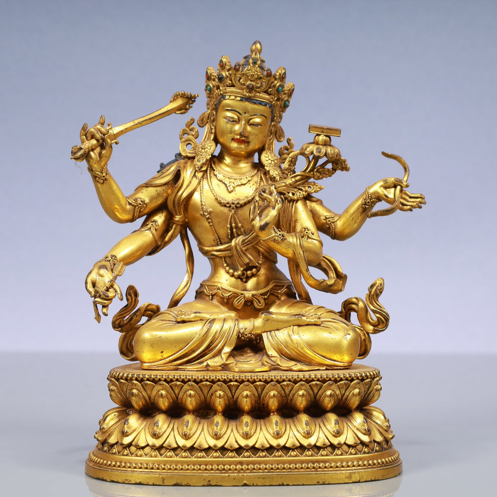 A Exquisite Gilt Bronze Statue of Manjusri: A Exquisite Gilt Bronze Statue of Manjusri Ming Dynasty, China Yongle Six-character Mark Size:6.5inx3.9inx8.3in Weight:1700g铜鎏金文殊菩萨佛像 
