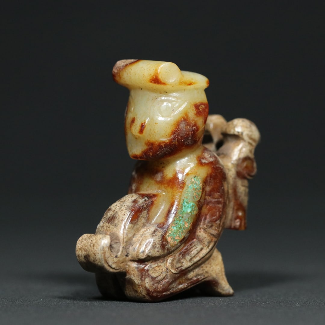 An Exquisite White Jade Inlaid Turquoise Figure Ornament: An Exquisite White Jade Inlaid Turquoise Figure Ornament W.Zhou , China Size:2.3inx2.1inx0.9in Weight:73.7g白玉镶嵌绿松石玉人遇贵É
