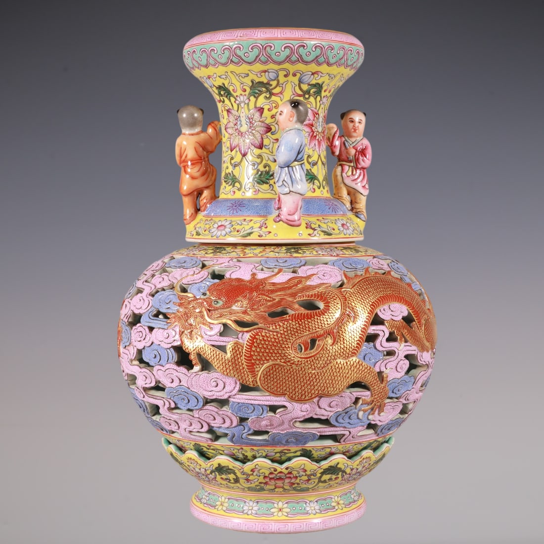An Exquisite Enamel Dragon Pattern Lotus Pattern Vase: An Exquisite Enamel Dragon Pattern Lotus Pattern Vase Qing Dynasty, China Qianlong Four-character Mark Size:10.6inx8.3in珐琅彩雕刻镂空龙纹转