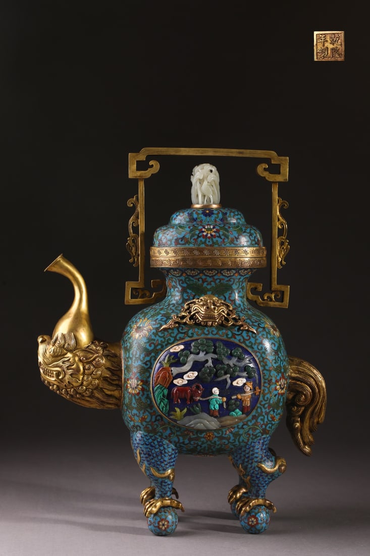 An Exquisite Cloisonne Inlaid Gems Lotus Pattern Character and Story Pattern Ewer: An Exquisite Cloisonne Inlaid Gems Lotus Pattern Character and Story Pattern Ewer Qing Dynasty, China Qianlong Four-character Mark Size:15.7inx11.8in Weight:4.45kg景泰蓝嵌į