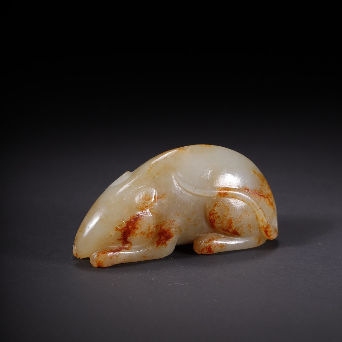 An Exquisite White Jade Mouse: An Exquisite White Jade Mouse Qing Dynasty, China Size:2.4inx0.9inx1.1in Weight:53.2g白玉鼠 中国清代 Size:6.0cmx2.3cmx2.7cm Weight:53.2g