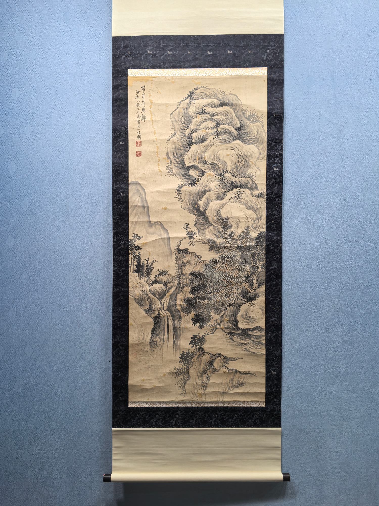 A Chinese Vertical Scroll Ink Painting of Landscape on Paper: A Chinese Vertical Scroll Ink Painting of Landscape on Paper Shi tao Size:19.5inx45.9in石涛带月荷樵归 纸本立轴Size:49.5cmx116.5cm