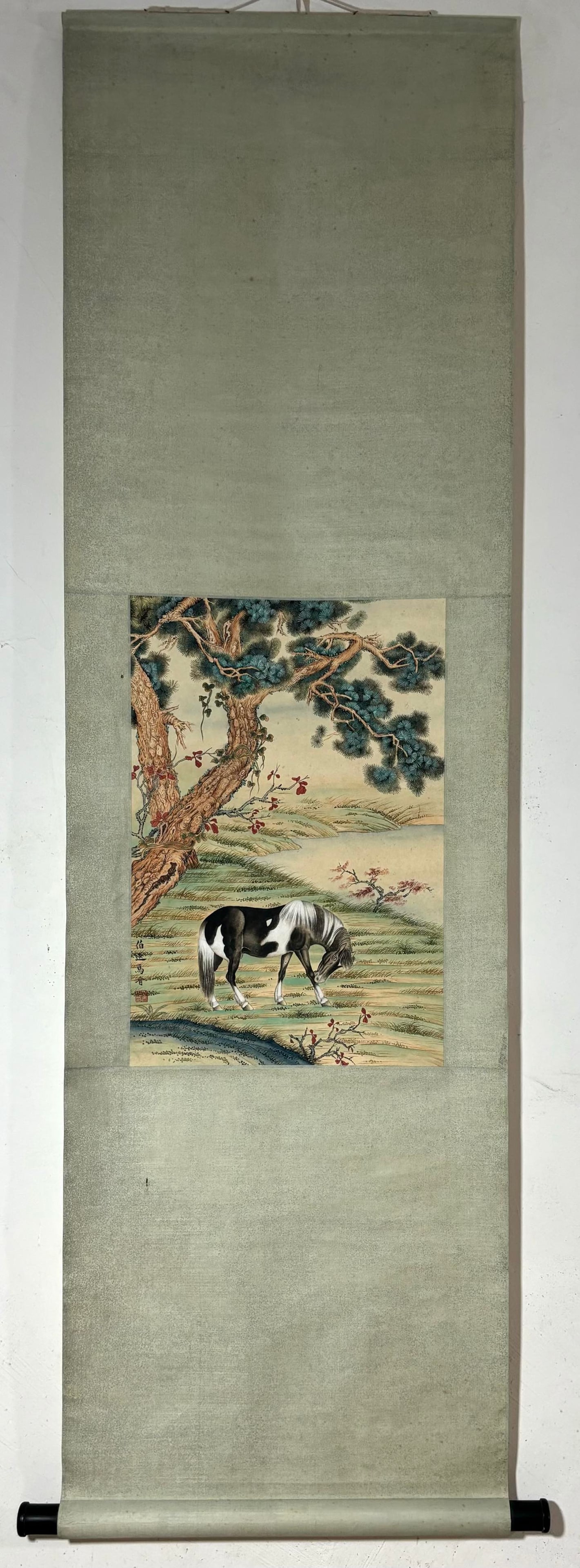 A Chinese Vertical Scroll Ink Painting of Horse on Paper: A Chinese Vertical Scroll Ink Painting of Horse on Paper Ma jin Without frame Size:21.5inx14.4in马晋松下骏马图 纸本立轴Without frame S
