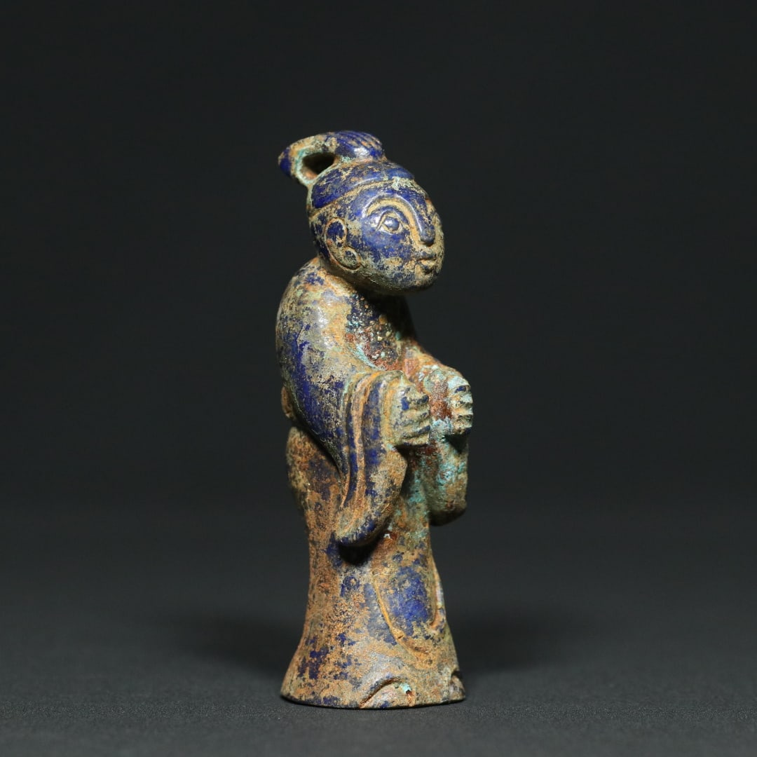An Exquisite Lapis Lazuli Figure Pendant: An Exquisite Lapis Lazuli Figure Pendant Han Dynasty, China Size:3.1inx1.1inx1in Weight:74.6g青金石玉人玉俑人物挂件 中国&#