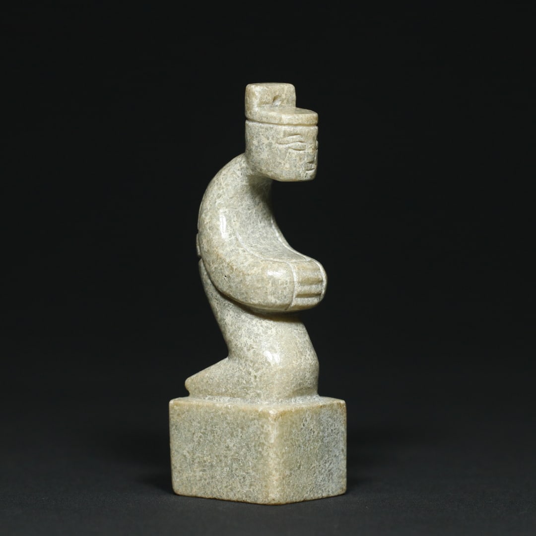 An Exquisite White Jade Figure Seal: An Exquisite White Jade Figure Seal Han Dynasty, China Size:3.8inx1.3inx1.1in Weight:126.6g白玉人钮印章 中国汉代 Size:9.6cmx3.2cmx2.8cm Weig