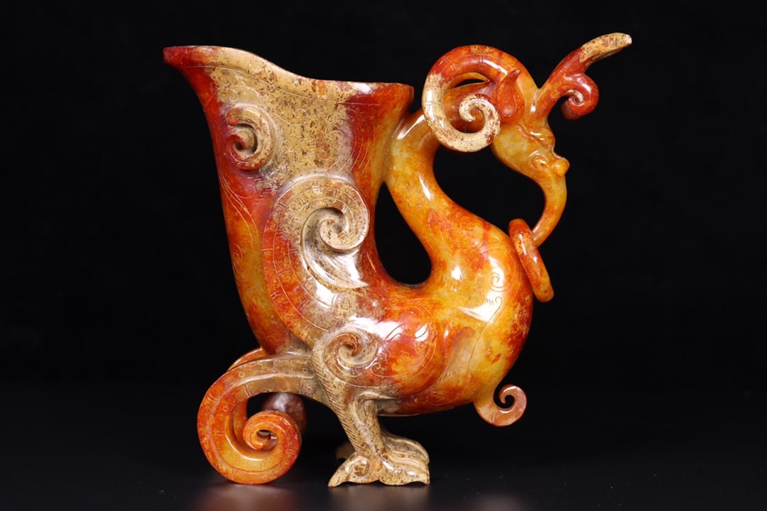 A Exquisite Hotan Jade Phoenix Pattern Cup: A Exquisite Hotan Jade Phoenix Pattern Cup,Han Dynasty, China,Size:6.5inx2.6inx6.3in ,Weight:1058g 和田玉凤纹杯,中国汉代