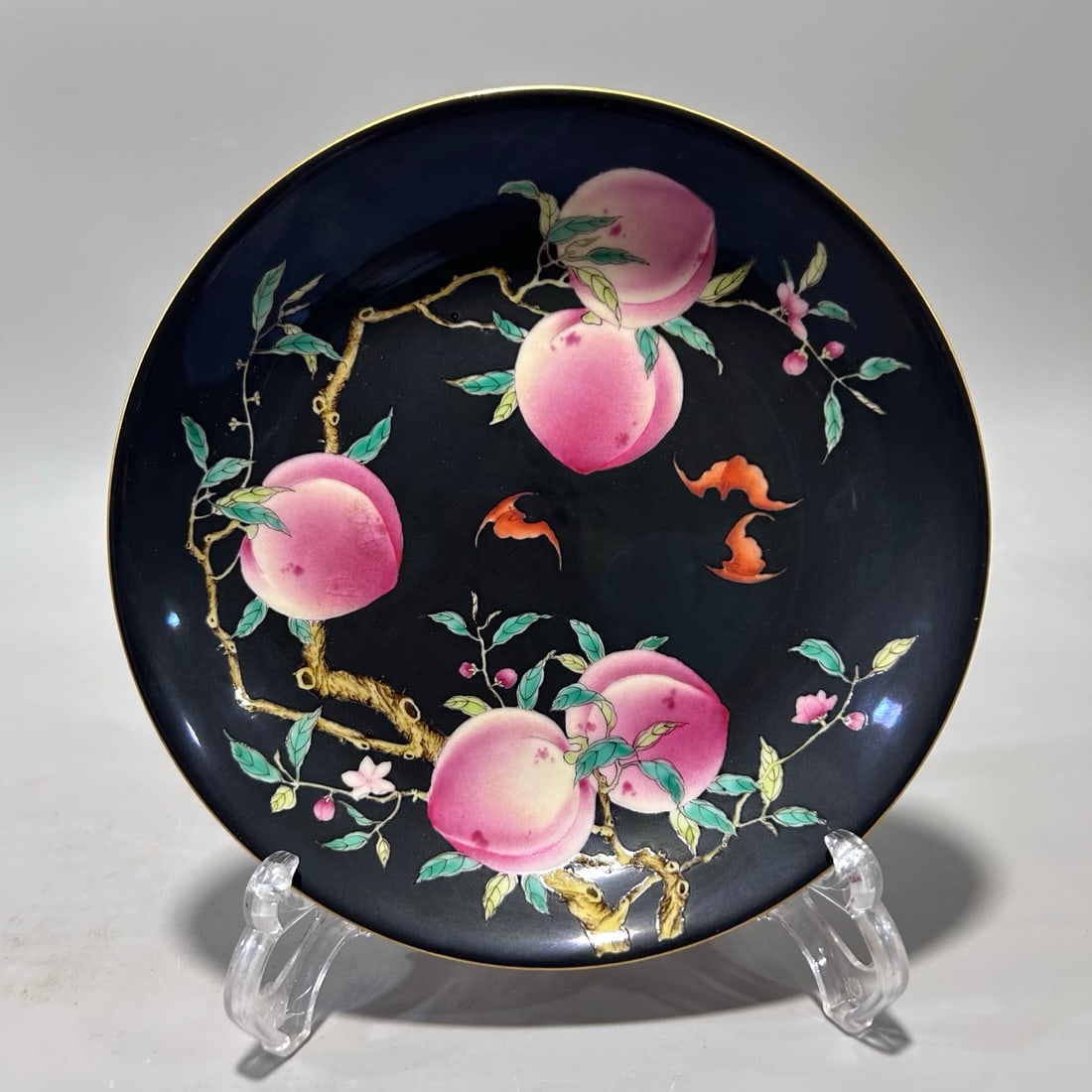 A Exquisite Black Ground Famille-Rose Bats and Peach Pattern Plate: A Exquisite Black Ground Famille-Rose Bats and Peach Pattern Plate,Qing Dynasty, China,Qianlong Four-character Mark,Size:7inx1.5in 黑地粉彩蝙蝠桃子ń