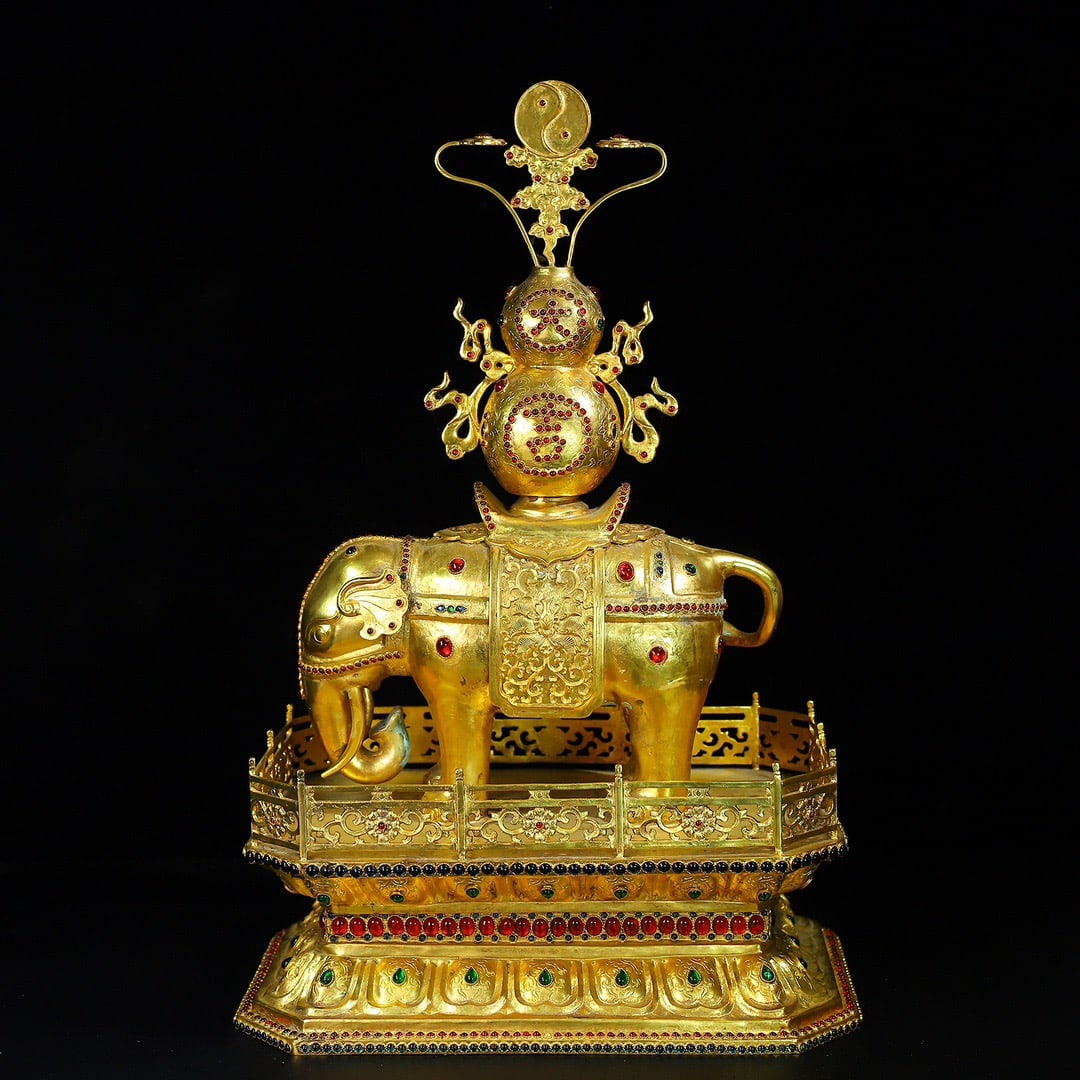 A Exquisite Gilt Bronze Inlaid Gems Elephant Ornament: A Exquisite Gilt Bronze Inlaid Gems Elephant Ornament,Qing Dynasty, China,Qianlong Four-character Mark,Size:13inx8.7inx19.7in,Weight:7235g 铜鎏金镶宝石象Ā
