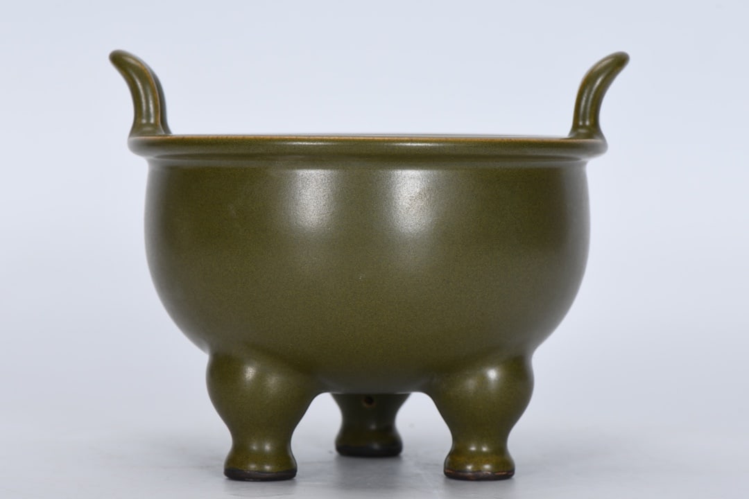 A Exquisite Teadust Glazed Double-Ears Tripod Censer: A Exquisite Teadust Glazed Double-Ears Tripod Censer,Qing Dynasty, China,Qianlong Six-character Mark,Size:5.1inx5.7inx3.5in 茶叶末釉双耳三足香