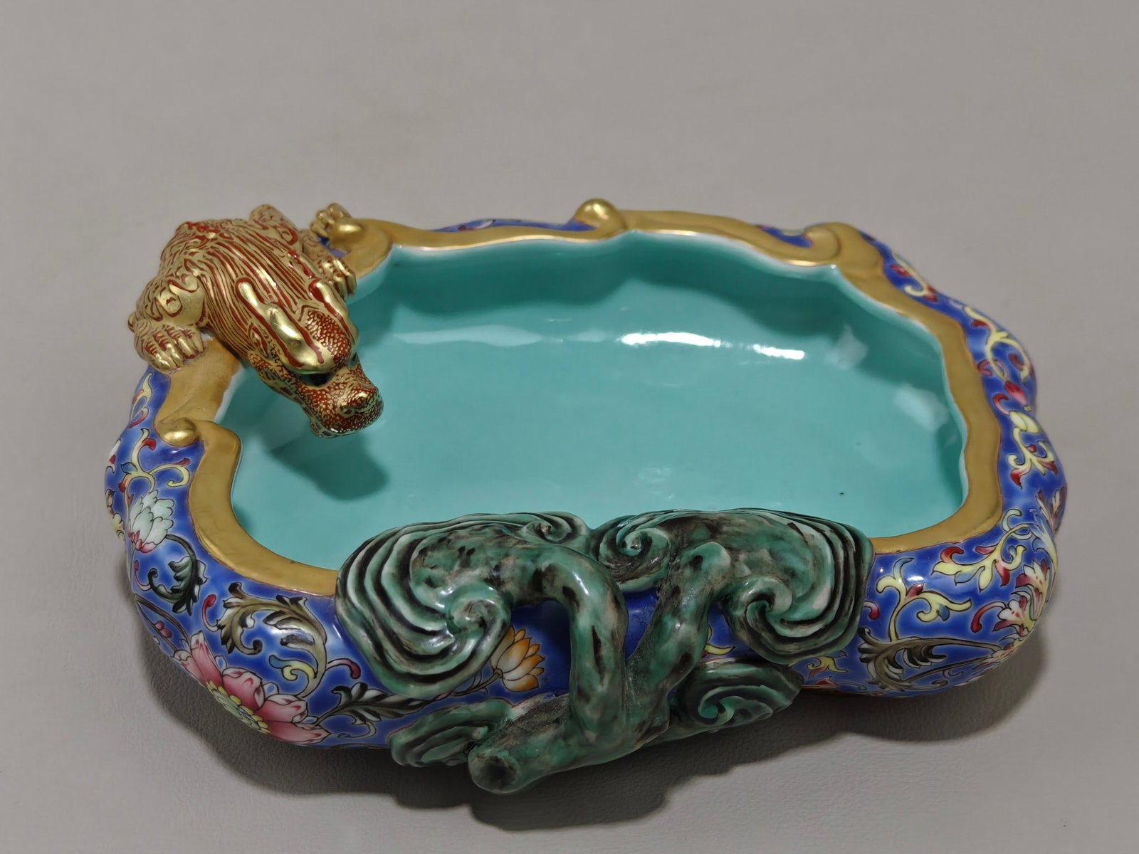 A Exquisite Famille-Rose Blue Ground Lotus Pattern Brush Washer: A Exquisite Famille-Rose Blue Ground Lotus Pattern Brush Washer,Qing Dynasty, China,Qianlong Six-character Mark,Size:2inx5.3inx4.7in 粉彩蓝地缠枝莲纹
