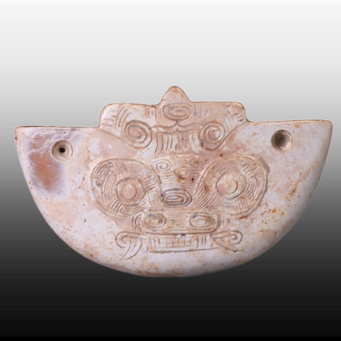 A Exquisite Gaogu Jade Beast-Face Pattern Ornament: A Exquisite Gaogu Jade Beast-Face Pattern Ornament,Ancient Time, China,Size:3inx1.8inx3.9in,Weight:37g 高古玉兽面纹摆件,远古时期