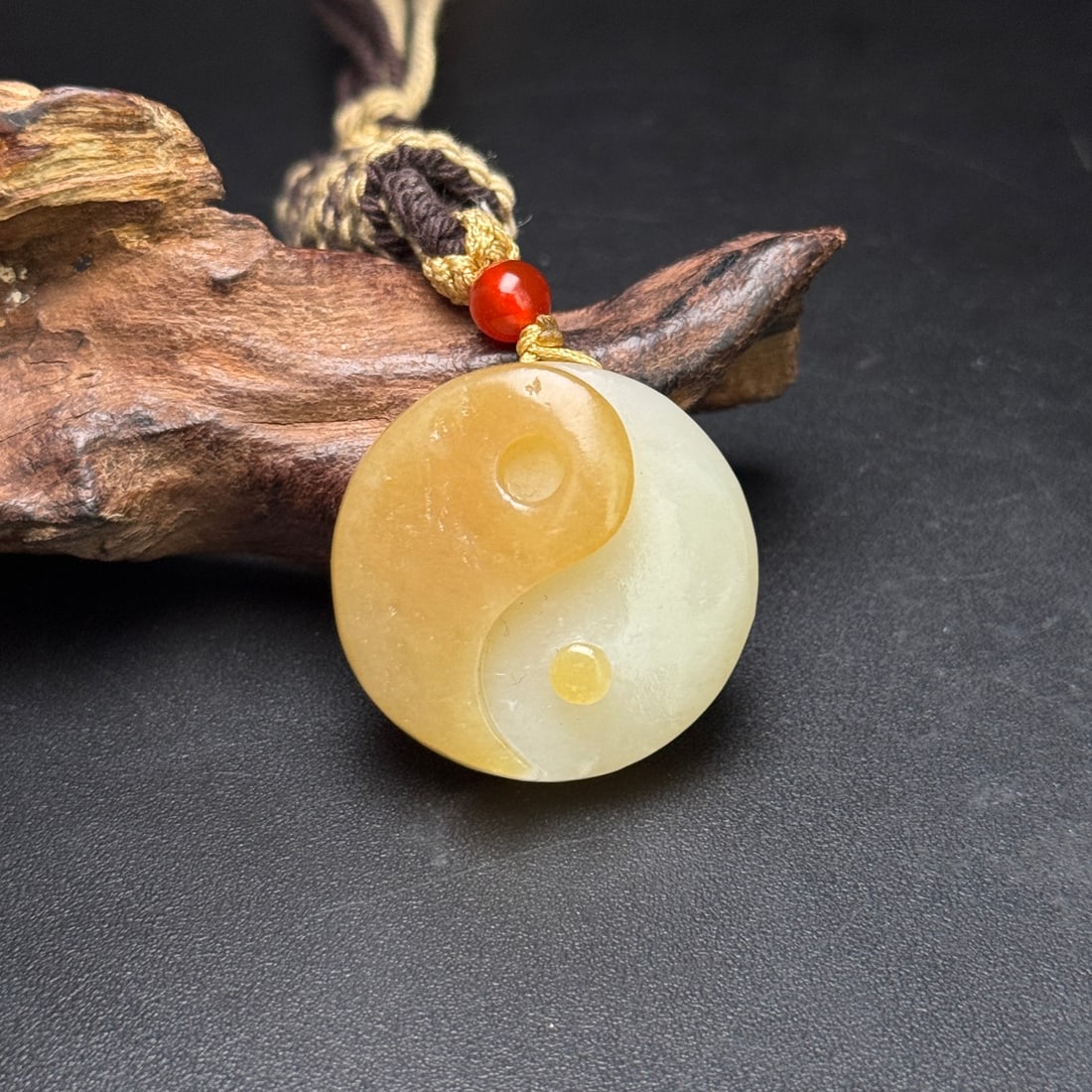 A Exquisite Hotan Jade Taiji Pendant: A Exquisite Hotan Jade Taiji Pendant,Qing Dynasty, China,Size:1.3inx0.4in ,Weight:21g 和田玉太极玉佩,中国清代