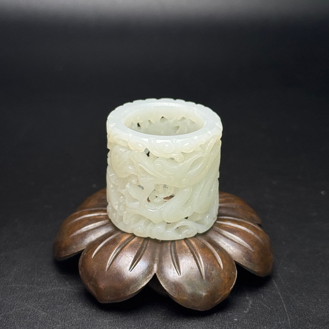 A Exquisite Hotan White Jade Dragon Pattern Thumb Ring: A Exquisite Hotan White Jade Dragon Pattern Thumb Ring,Qing Dynasty, China,Size:1.2inx1.1in, Weight:23g 和田白玉龙纹扳指,中国清代