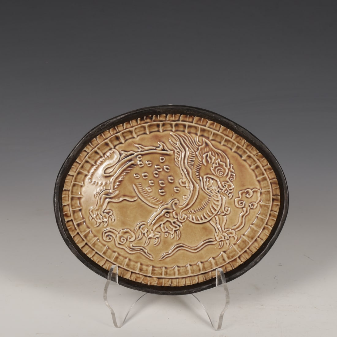 A Exquisite Ding Yao Brown Color Silver Mounted Mouth Kylin Pattern Plate: A Exquisite Ding Yao Brown Color Silver Mounted Mouth Kylin Pattern Plate,Song Dynasty, China,Size:0.7inx6.1in 定窑褐彩银口麒麟纹盘,中