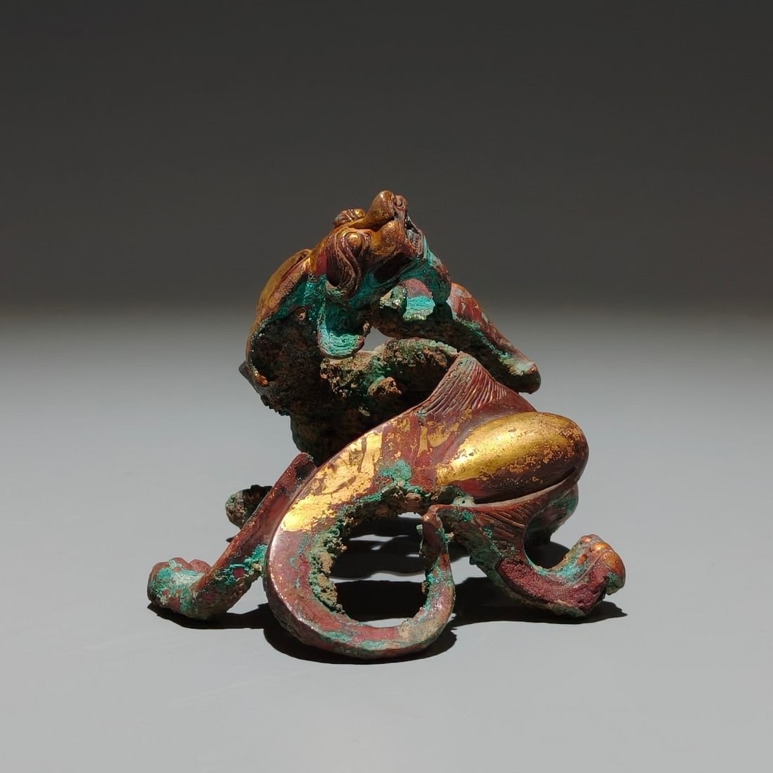 A Exquisite Gilt Bronze Dragon Ornament: A Exquisite Gilt Bronze Dragon Ornament,Han Dynasty, China,Size:3inx3.5inx3.1in 铜鎏金龙摆件,中国汉代